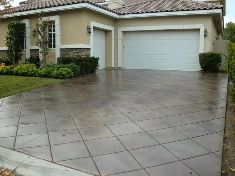 Brown stained concrete driveway